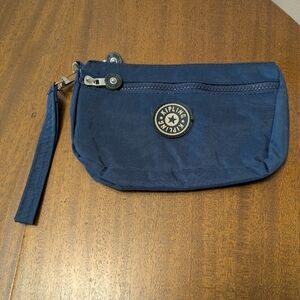 Kipling Pouch.  2 Compartments & 2 Zippers.  Nylon.  Never Used.